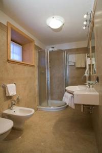 Koupelna v ubytování Hotel Capriolo