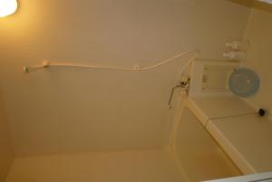 a bathroom with a sink and a toilet in it at Ryokan Shimizu in Kyoto +30 photos