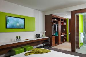 TV a/nebo společenská místnost v ubytování Mere Hotel