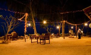 Fotografie z fotogalerie ubytování Flame Tree Cottages v destinaci Nungwi