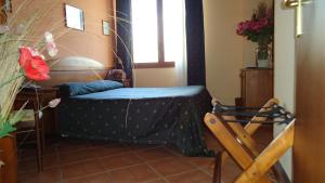 Letto o letti in una camera di Hotel Archimede Ortigia