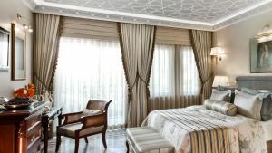 Säng eller sängar i ett rum på Ali Bey Resort Sorgun