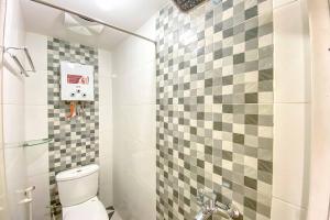 Bagno di Tini's Guest House Malang Mitra RedDoorz