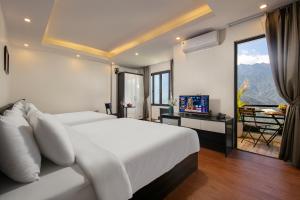 TV a/nebo společenská místnost v ubytování Sapa Valley view hotel