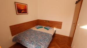 Łóżko lub łóżka w pokoju w obiekcie Apartment Rolih