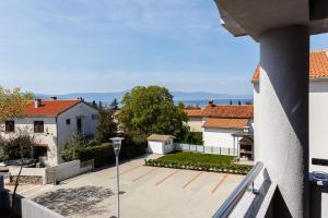 a view from the balcony of a house at Apartment Adria 3 in Malinska
