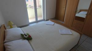 Postel nebo postele na pokoji v ubytování Apartment Grahovac 4