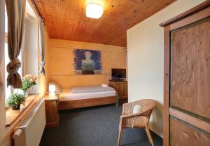 Postel nebo postele na pokoji v ubytování Hotel Plesivec