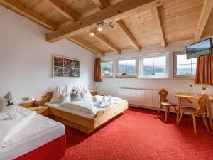 Postel nebo postele na pokoji v ubytování Hotel Post