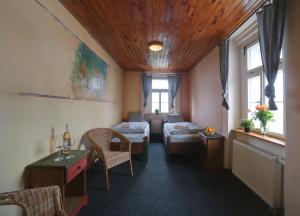 Postel nebo postele na pokoji v ubytování Hotel Plesivec