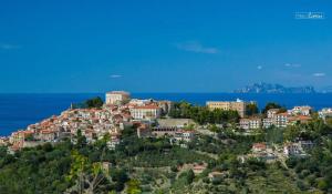 a town on a hill near the ocean at Charming apartment in Santa Maria, 60 m², sea view in Santa Maria di Castellabate
