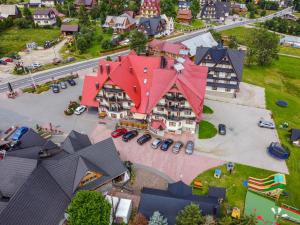 an overhead view of a house with a red roof at Dom Wypoczynkowy U Chramca in Białka Tatrzańska