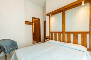 Postel nebo postele na pokoji v ubytování Albergo Miramare