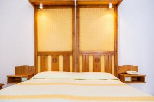 Postel nebo postele na pokoji v ubytování Albergo Miramare