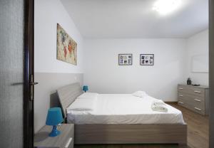 Кровать или кровати в номере Yourbanflat San Giovanni