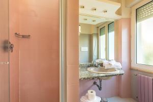 Koupelna v ubytování Albergo Miramare