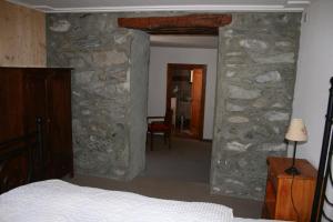 Postel nebo postele na pokoji v ubytování Hotel de la Sage