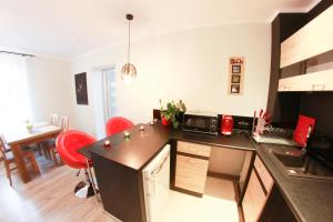 Kuchnia lub aneks kuchenny w obiekcie Apartamenty u Piątków
