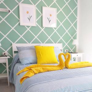 Postel nebo postele na pokoji v ubytování Apartamento Margarita