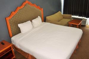 Llit o llits en una habitació de Hotel Elev8