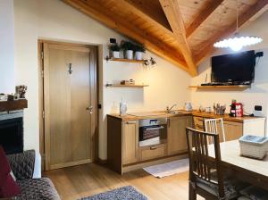 Kuchyň nebo kuchyňský kout v ubytování Chalet Nocciolini