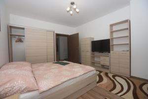 Posteľ alebo postele v izbe v ubytovaní Ádám Guesthouse I.