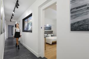Postel nebo postele na pokoji v ubytování Gallery Suite