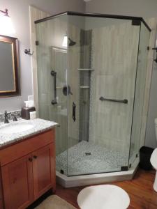 a shower with a glass door in a bathroom at Cider House Bed and Breakfast in Waynesboro +30 photos