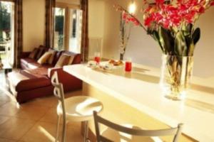 A seating area at TREMEZZO RESIDENCE 5-1 of 11 apartments in an exclusive residence by Italian Apartments