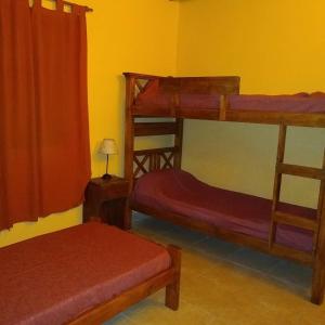 En eller flere senge i et værelse på Sueño del Bosque II