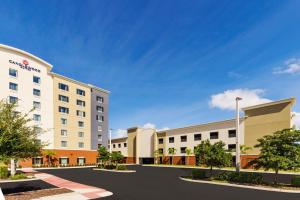 a rendering of the front of a hotel at Candlewood Suites - Orlando - Lake Buena Vista, an IHG Hotel in Orlando