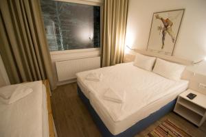 Postel nebo postele na pokoji v ubytování Staza Resort