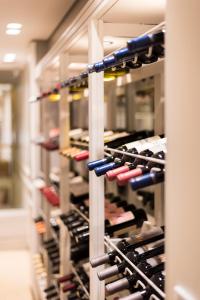 a room filled with lots of wine bottles at CasaSur Recoleta in Buenos Aires