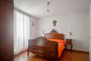 Łóżko lub łóżka w pokoju w obiekcie La Casona de Doña Clotilde