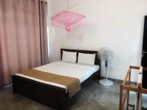 Postel nebo postele na pokoji v ubytování The Nest