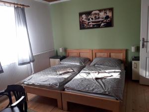 Postel nebo postele na pokoji v ubytování Penzion Na Střelnici