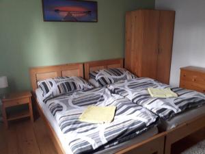 Postel nebo postele na pokoji v ubytování Penzion Na Střelnici
