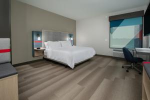 Postel nebo postele na pokoji v ubytování Avid hotels - Beaumont by IHG