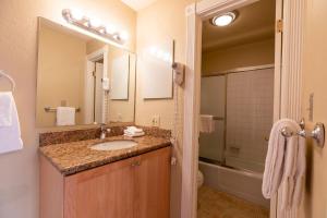 a bathroom with a sink and a mirror at Breakaway West - Studio, 2,3 Bedrooms by Vail Realty in Vail