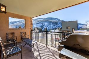 a balcony with a view of the mountains at Breakaway West - Studio, 2,3 Bedrooms by Vail Realty in Vail