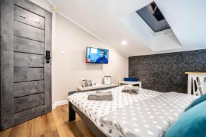 Llit o llits en una habitació de NEW Apartament GREEN Warszawa PARKING Free