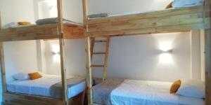 Двухъярусная кровать или двухъярусные кровати в номере PUERTO "TE"