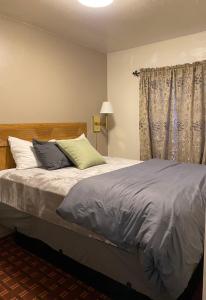Posteľ alebo postele v izbe v ubytovaní Monte Bianco Inn