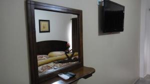 TV a/nebo společenská místnost v ubytování Baraka Al Aqaba Hotel Suites + 37 fotografií