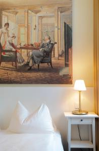 Postel nebo postele na pokoji v ubytování Boutique Hotel Columbia