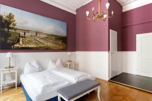 Postel nebo postele na pokoji v ubytování Boutique Hotel Columbia