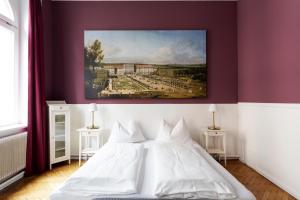 Postel nebo postele na pokoji v ubytování Boutique Hotel Columbia