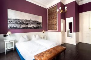 Postel nebo postele na pokoji v ubytování Boutique Hotel Columbia