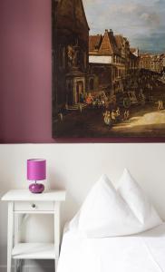 Postel nebo postele na pokoji v ubytování Boutique Hotel Columbia