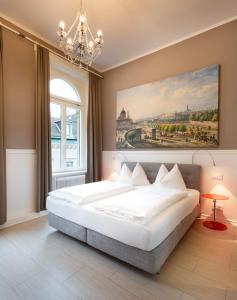 Postel nebo postele na pokoji v ubytování Boutique Hotel Columbia